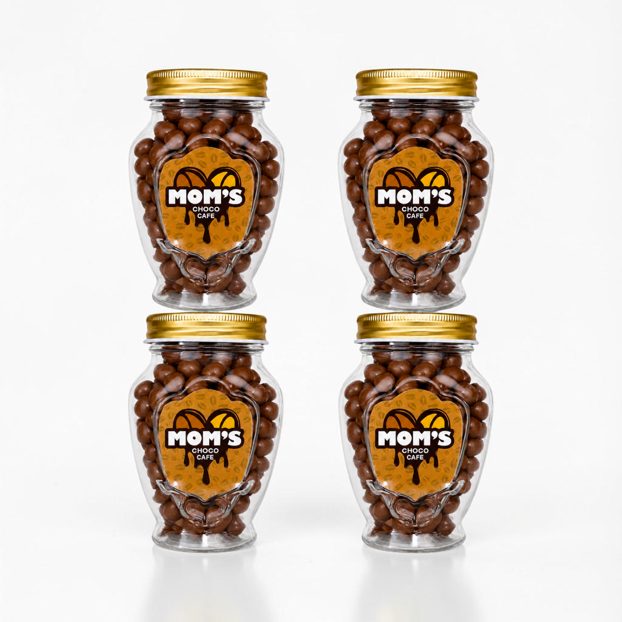 Four jars of 'Mom's Cafe' chocolate covered almonds on a white background